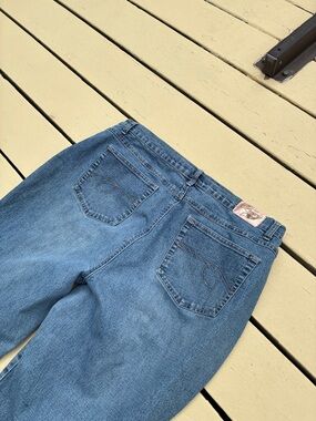 Foxy Baggy bootcut jeans with buttons at the leg openings
